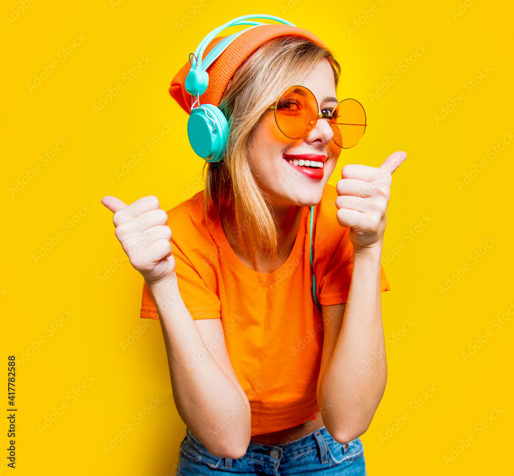girl with orange glasses and headphones girl with orange glasses and headphones