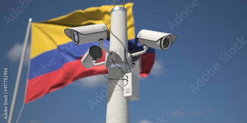 Outdoor security cameras near flag of Colombia. 3d rendering