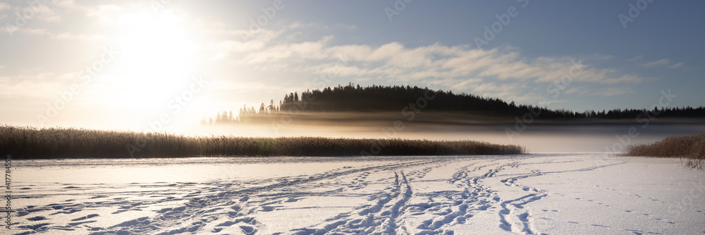 Winter landscape in Finland. Panoramic view of snow-covered sea.
