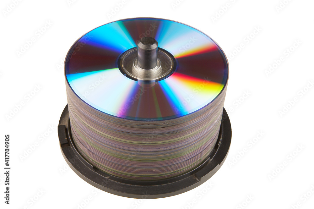A pile of rewritable dvd's on a white background. A pile of rewritable dvd's on a white background.