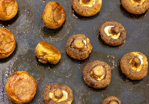 Baked mushrooms champignons in the oven.