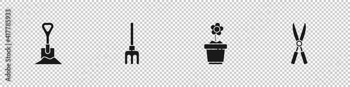 Set Shovel in the ground, Garden rake, Flower pot and Gardening handmade scissors icon. Vector.