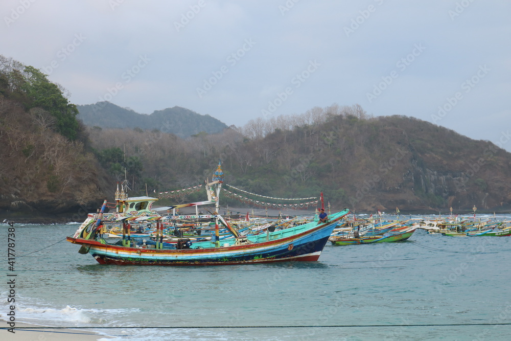 view of the fishing boats on the coast of Papuma, Jember, East Java
