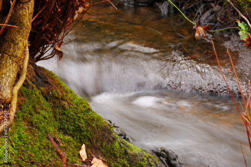 long exposure of the waterfall of a forest stream