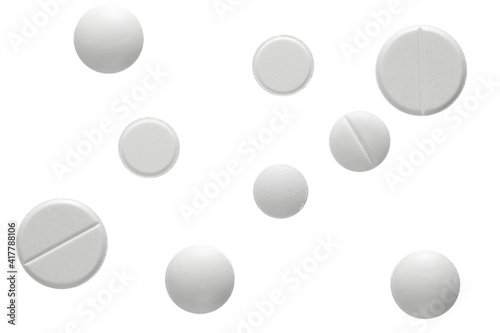 Картината върху платно Different shaped White Pills on white background.