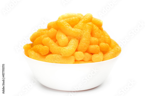 Cheese Doodle Day, crisps , cheese puffs in a white bowl 