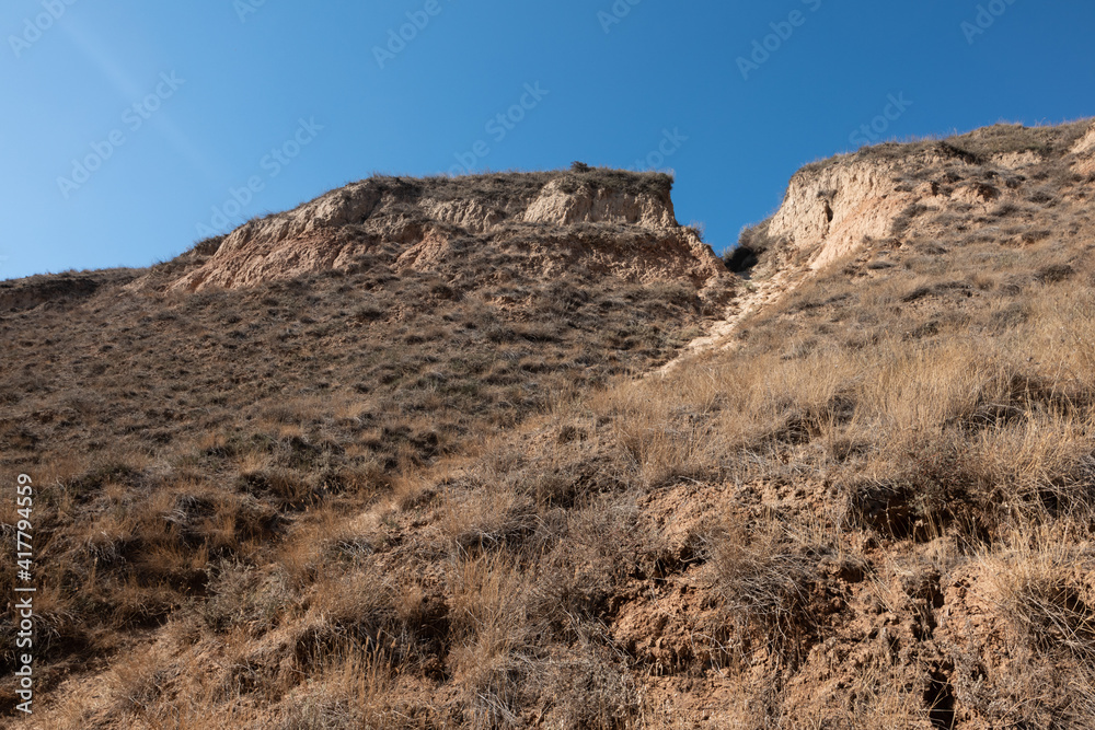 View of high clay mountains, rocks and hills near the Dnieper estuary and Black Sea. Stanislav, Grand Canyon of Kherson region, Ukraine.