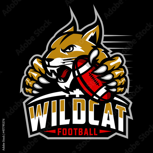 wildcat football team design with head mascot bobcat  lynx holding ball in the claw. Great for team or school mascot or t-shirts and others.