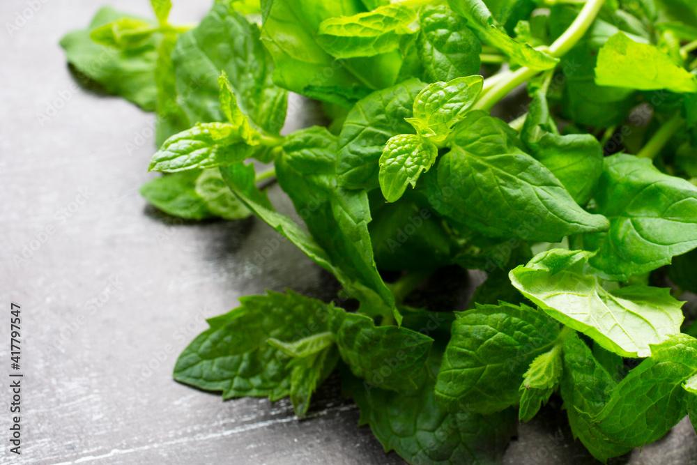 Fresh mint on wooden table copy space Fresh mint on wooden table copy space
