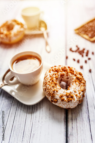 White donut with chocolate sprinkle