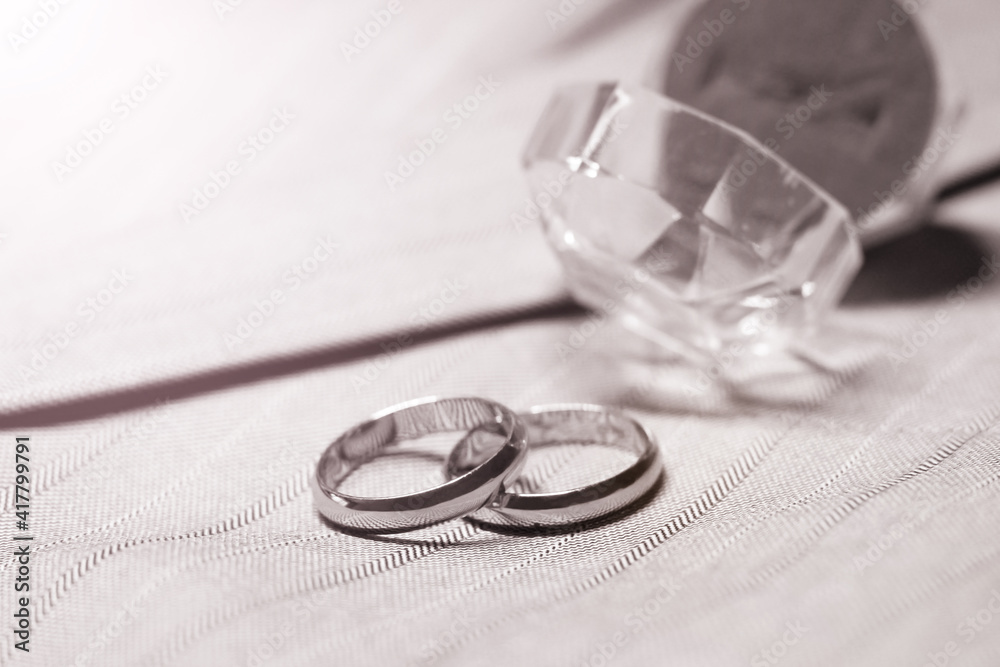 Wedding rings detail with wedding jacket, black and white Wedding rings detail with wedding jacket, black and white