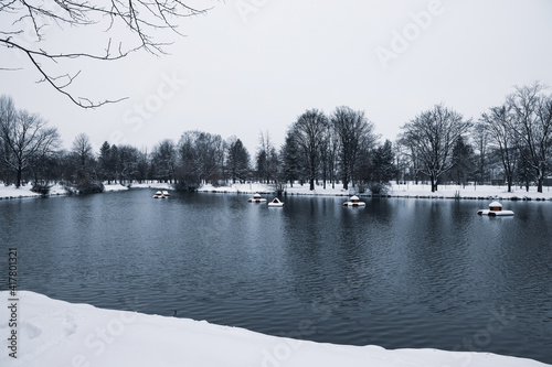Scenic view of lake in snow winter; nature background.