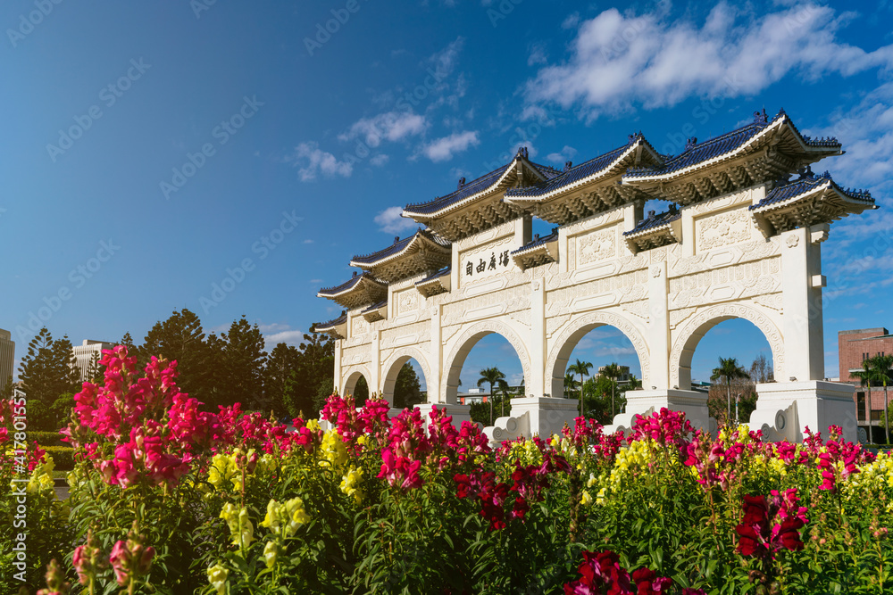 Front gate of Chiang Kai-Shek Memorial Hall with beautiful flowers in spring, Taipei, 
