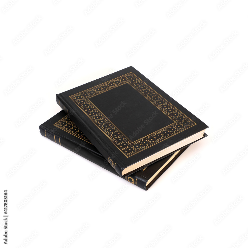Stack of books in black covers with white sheets isolated on a white background Stack of books in black covers with white sheets isolated on a white background