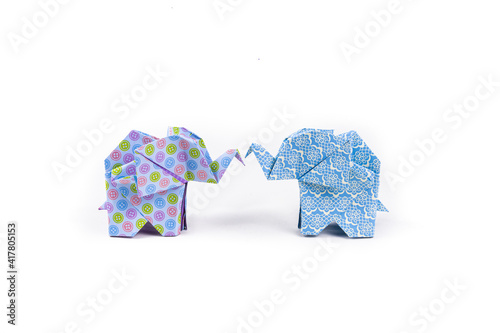 Sticker Closeup shot of colorful patterned origami elephants isolated on a white backgro