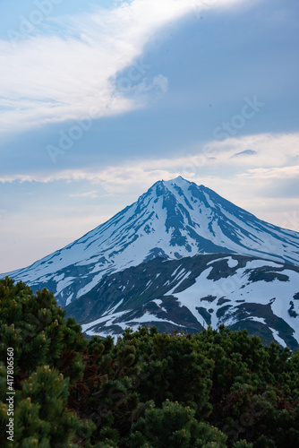 snowy volcano in summer