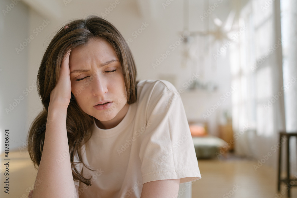 Tired of work is a young woman. Burnout in business. Overloading information Tired of work is a young woman. Burnout in business. Overloading information