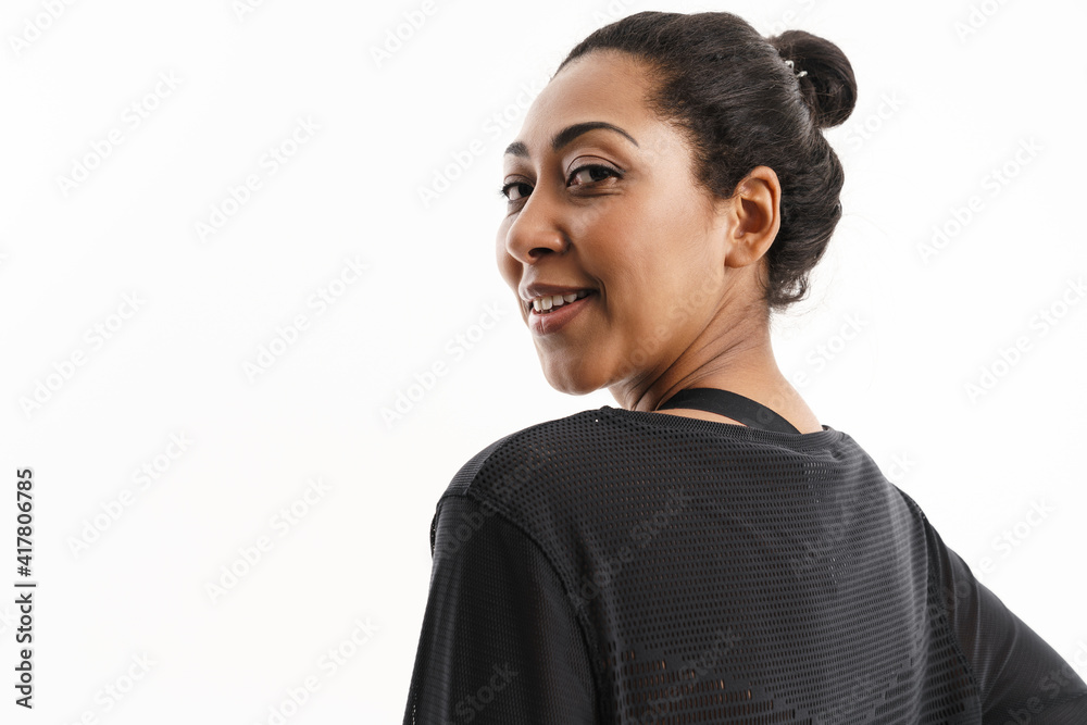 Happy african american woman looking and smiling at camera Happy african american woman looking and smiling at camera
