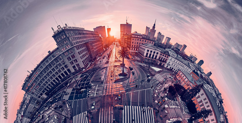 Beautiful panoramic aerial sunset drone skyline view of the Warsaw City Centre with skyscrapers of the Warsaw City Centre and artificial palm, Poland, EU