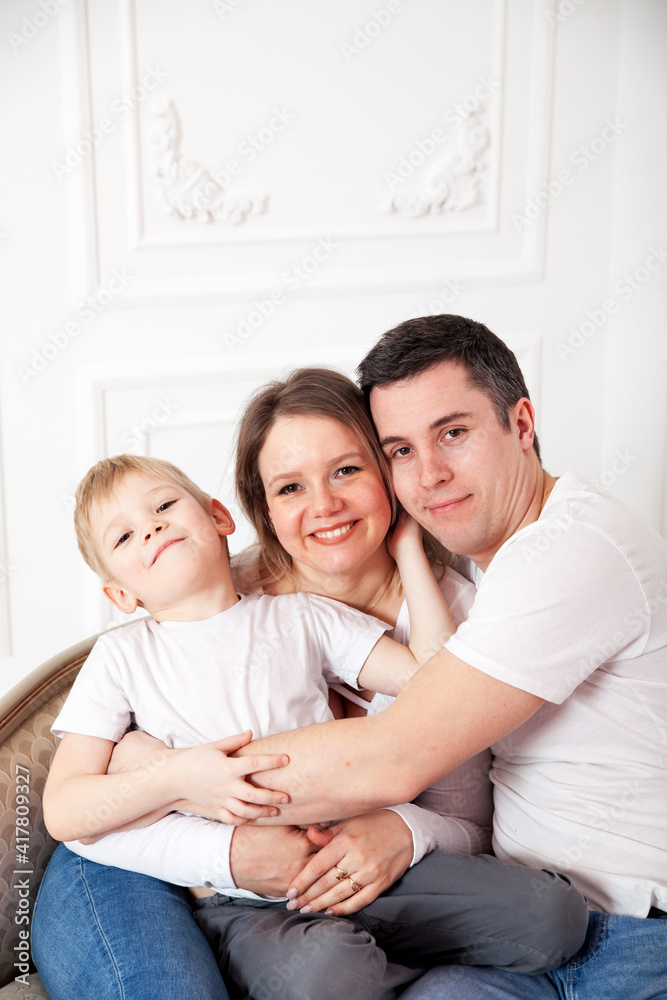 Portrait of happy family with young son. Portrait of happy family with young son.