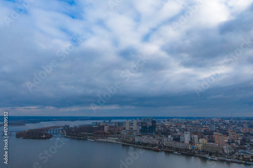 Dark clouds over the city in spring with drone
