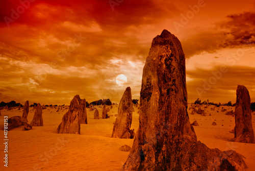 The Pinnacles are limestone formations appearing from the sand of the Nambung National Park, Western Australia photo