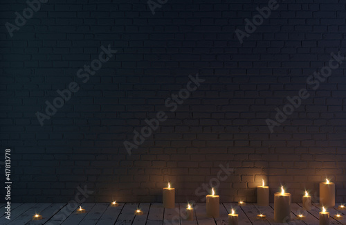 Dark blue brick wall background and candles