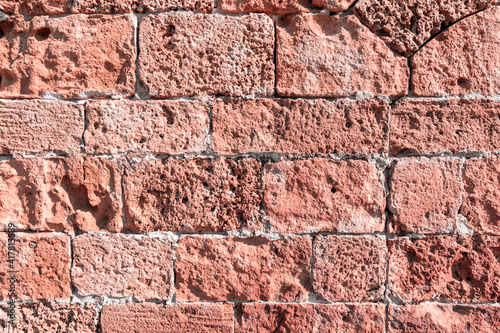 The texture of the stone surface. Porous masonry. Shell rock brick.