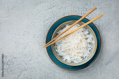 Shirataki noodles - gelatinous traditional Japanese noodles made from the konjac yam photo