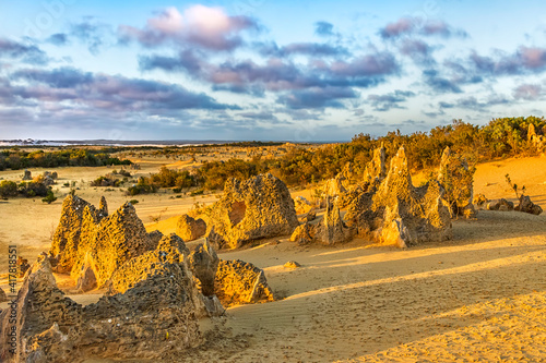 The Pinnacles are limestone formations appearing from the sand of the Nambung National Park, Western Australia photo