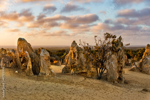 The Pinnacles are limestone formations appearing from the sand of the Nambung National Park, Western Australia photo