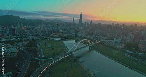 Beautiful sunset view of Rainbow bridge with Taipei city, Taiwan photo