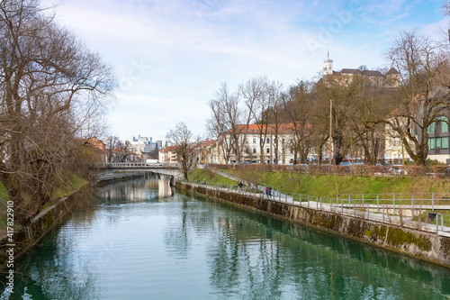 Ljubljana city centre at autumn in Slovenia with river Ljubljanica.