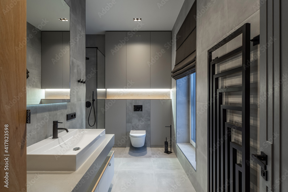 Modern interior in grey tones of bathroom in luxury apartment. Modern interior in grey tones of bathroom in luxury apartment.