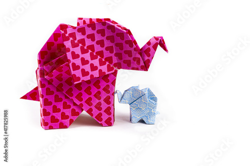 Canvas Print Closeup shot of colorful patterned origami elephants isolated on a white backgro