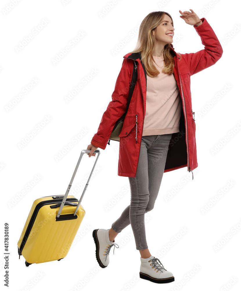 Woman with suitcase walking on white background. Winter travel Woman with suitcase walking on white background. Winter travel
