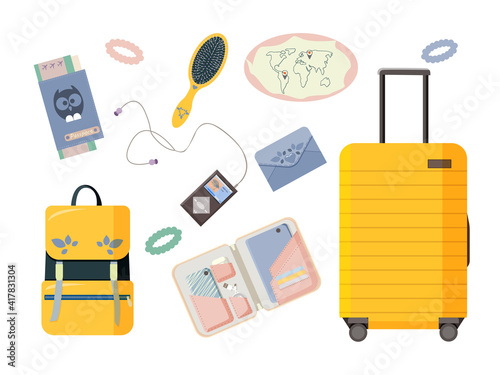 Tourist items isolated on white background. Suitcase on wheels, backpack, wallet, player, headphones, passport with plane tickets, organizer with tablet, phone, comb and hair bands
