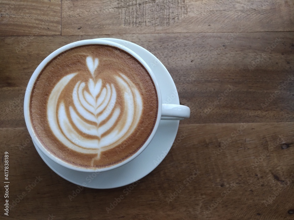 Wing Tulip latte art is the first coffee cup in the morning. Wing Tulip latte art is the first coffee cup in the morning.