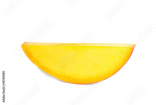Juicy mango slice on white background. Tropical fruit