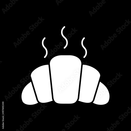 Fresh croissant dark mode glyph icon. Hot pastry. Steaming bakery goods. French cuisine. Food catering. Culinary and cookery. White silhouette symbol on black space. Vector isolated illustration