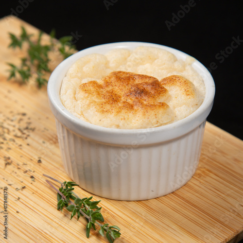 tender soufflé from ham baked in the oven with cheese