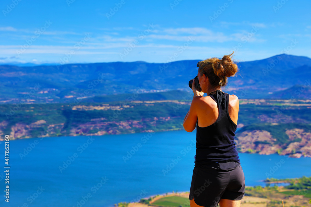woman shooting with camera beautiful panorama view