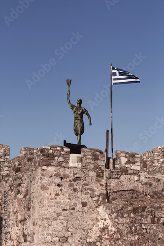 Statue of Cervantes at the old Venetian port in Nafpaktos (Lepanto). photo