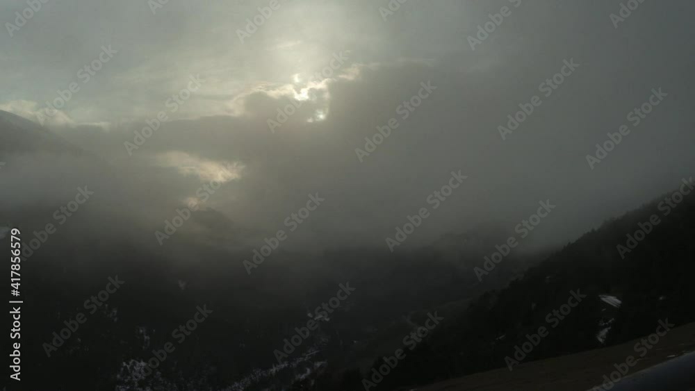 Timelapse of how a storm arrives in a valley of Andorra in the golden hour, at the beginning of the video you can see the entire valley Timelapse of how a storm arrives in a valley of Andorra in the golden hour, at the beginning of the video you can see the entire valley