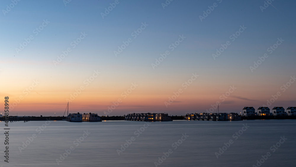 Der Hafen im Schleswig-holsteinische Ferienort Olpenitz  bei Sonnenuntergang oder Sonnen Aufgang
