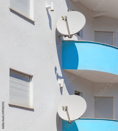 Balconies with satellite dishes