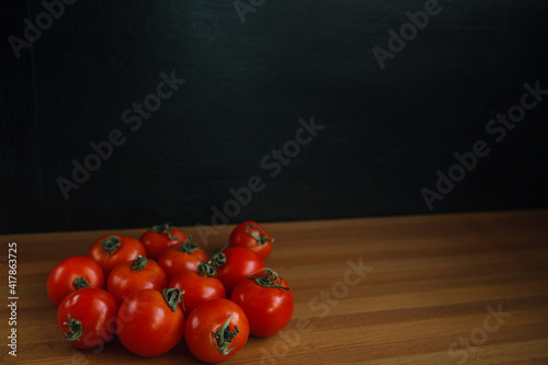 tomato on a black background vegetable pattern photo