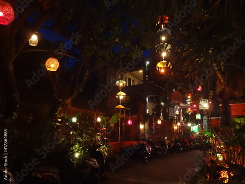 Night view of Colourful cloth lanterns lamp light shades hanging outside in Hoi An, Vietnam - ランタン 夜景 ホイアン ベトナム 
