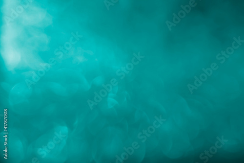Abstract blurred green bokeh background for graphic design and wallpaper, card. Copy space for text, banner.