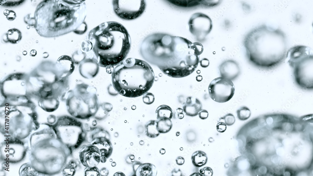 Light bubbles of water isolated over white, macro shot. Light bubbles of water isolated over white, macro shot.